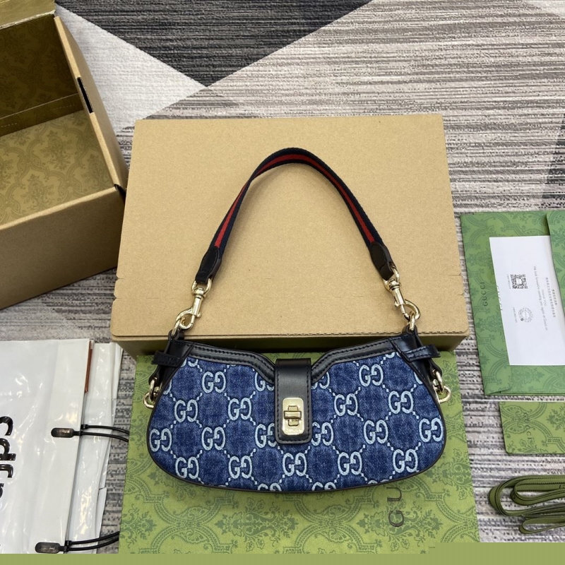 G*u*i top handle bags